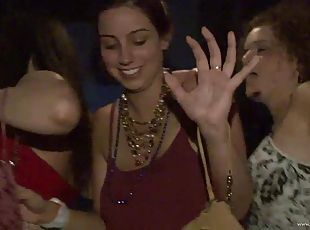 Dynamic party girl flashes her natural tits in public